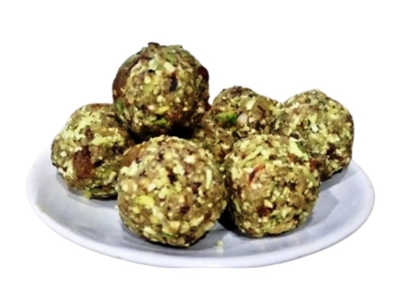 Special Meva Masala Laddu – Nutritious dry fruit laddus made with almonds, cashews, pistachios, dates, jaggery, and Ayurvedic superfoods for energy and immunity.